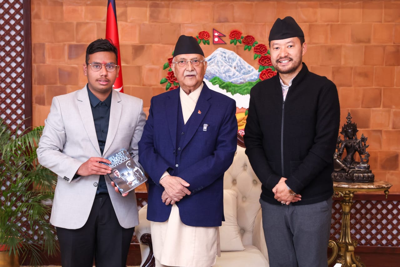 Book Handover to Prime Minister