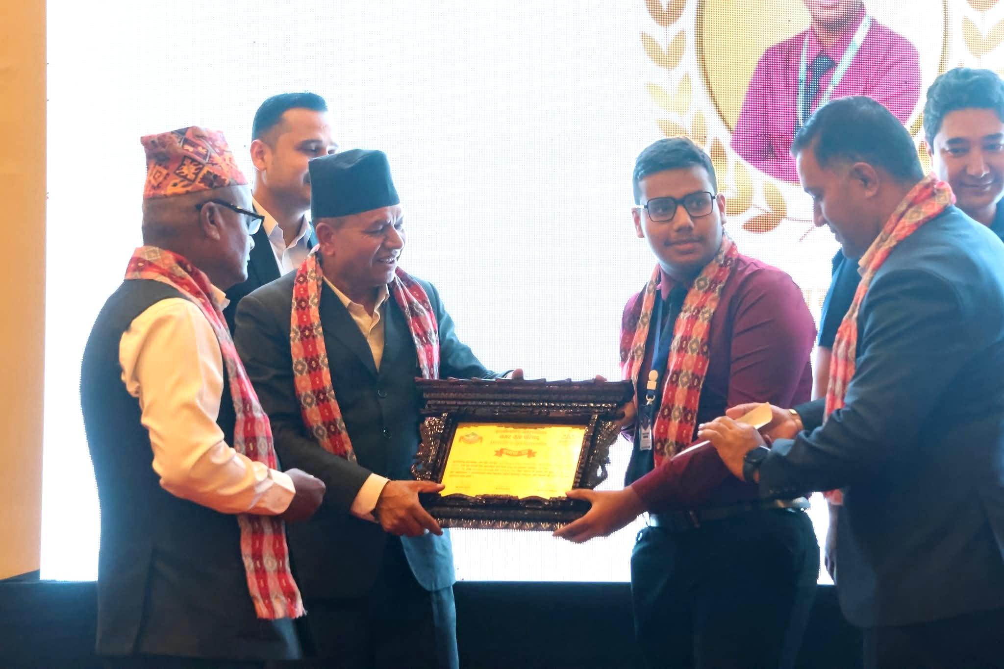 Prabesh Dahal at an award ceremony — young AI entrepreneur from Kathmandu, Nepal